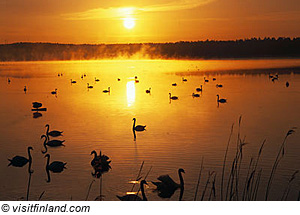Sonnenuntergang am See, Finnland